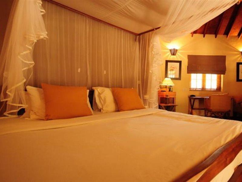 Cinnamon Wild Yala Kültér fotó A bedroom at the resort